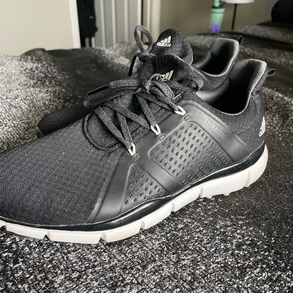 Adidas woman’s golf cleats